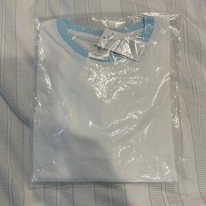 Girl Scout Brownie White Tee with Light Blue Collar. Size is Girls small/7–8.